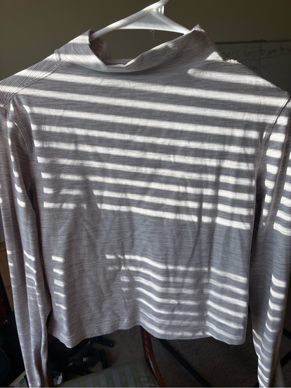Lululemon mockneck top size 4
White and gray striped